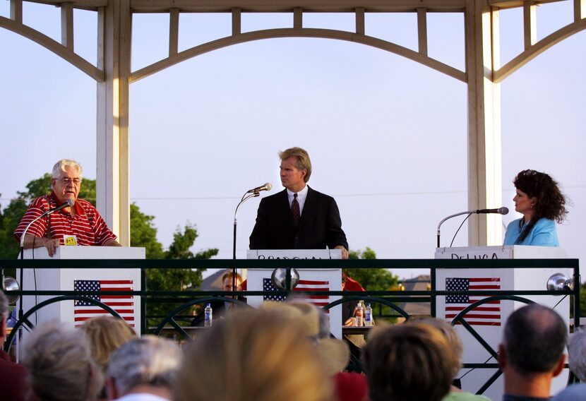 Flower Mound mayoral candidates Jack Stufflebam, Craig Bradshaw and Lori DeLuca debate under...