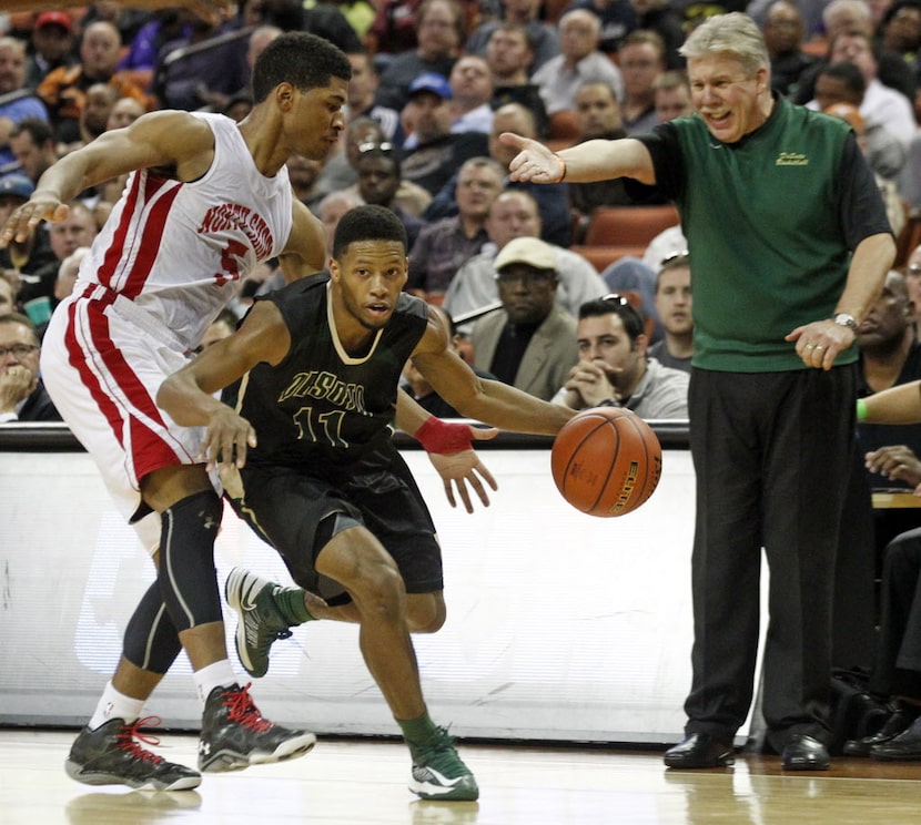 Desoto head coach Chris Dyer reacts as Desoto guard Takedrick Brown (11) tries to dribble...