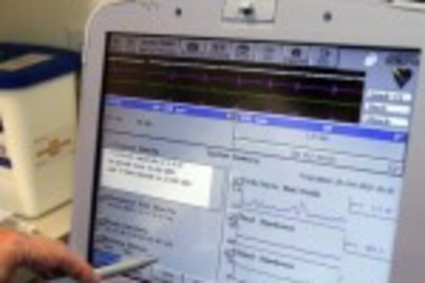  Software showing information from a defibrillator implanted in a patient at the University...