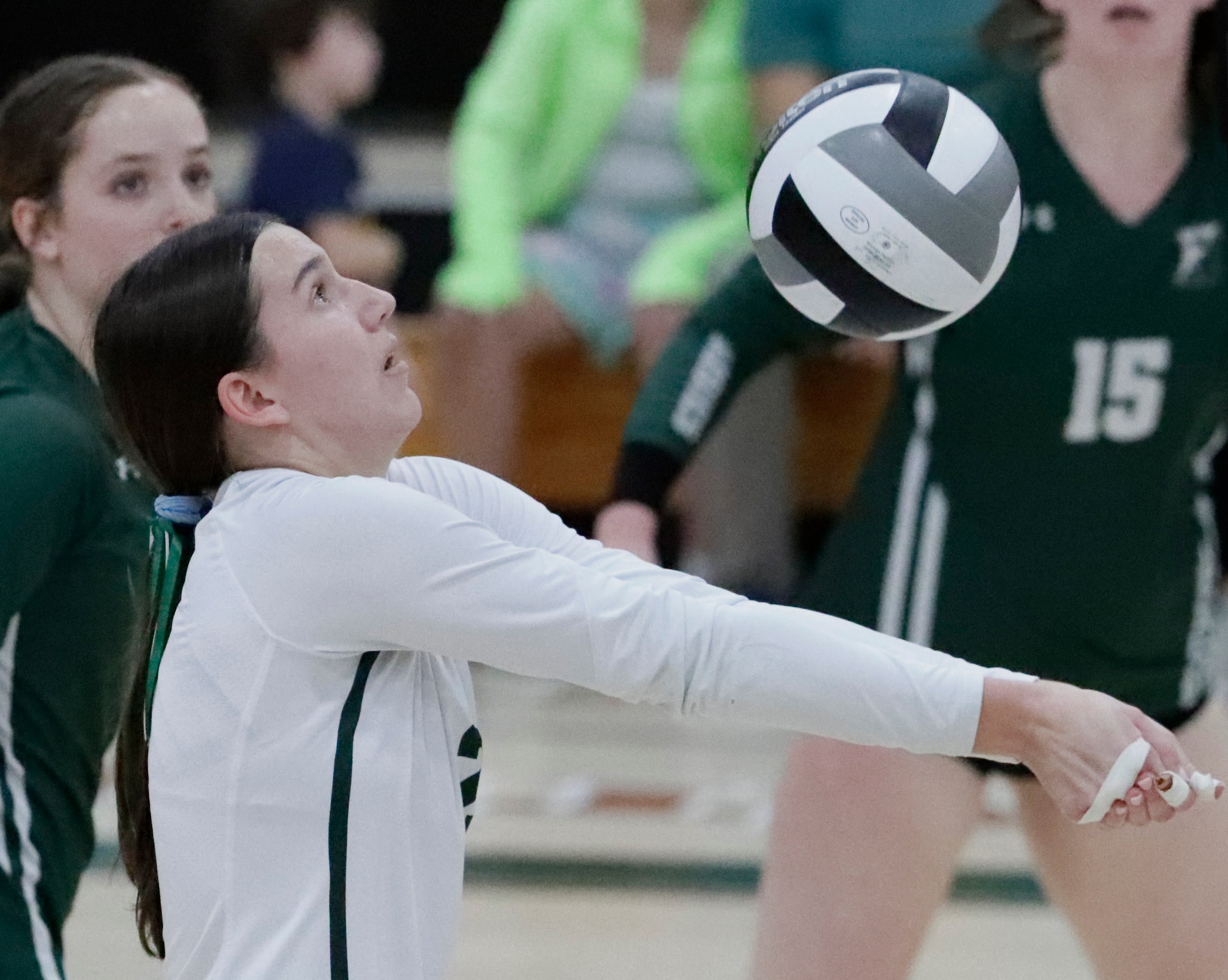 Hockaday libero Siena Ebert receives a serve during game one as Hockaday played Houston St....