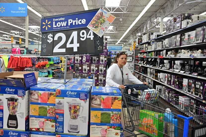 A woman shops at a Walmart Supercenter store in Rosemead, Calif., on May 23, 2019. Walmart...
