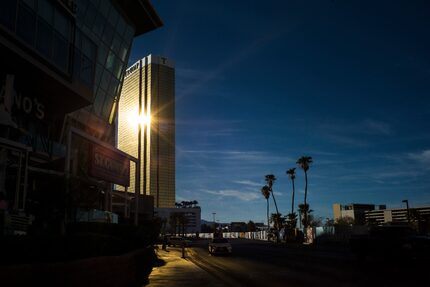 The sun reflects off the Trump Hotel Las Vegas, Oct. 19, 2016. The Trump Organization moved...