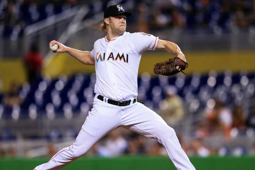 MIAMI, FL - SEPTEMBER 23: Andrew Cashner #48 of the Miami Marlins pitches during the game...