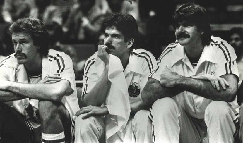 Mavericks center Kurt Nimphius (left), guard Jim Spanarkel and center Scott Lloyd watch from...