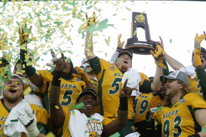 The North Dakota State Bison's celebrate after beating the Jacksonville State Gamecocks...