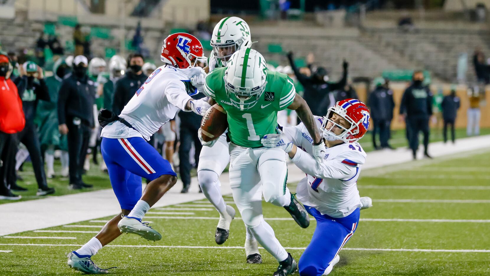 North Texas Mean Green wide receiver Jaelon Darden (1) catches a pass and runs in for a...