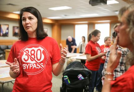 Tara Voigt, who opposes the U.S. 380 bypass, speaks during a Texas Department of...