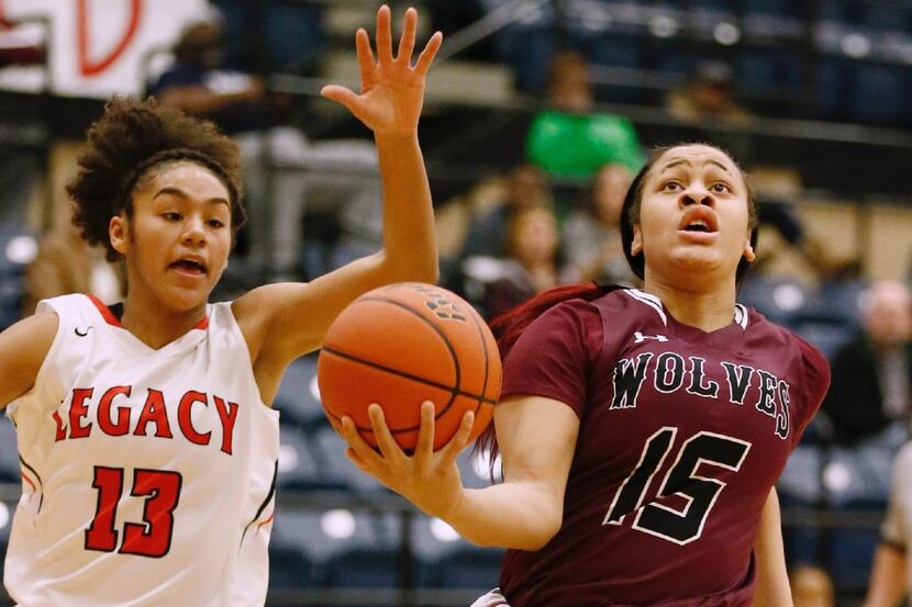 Mansfield Timberview senior guard Chennedy Carter (15) goes for a layup as Mansfield Legacy...