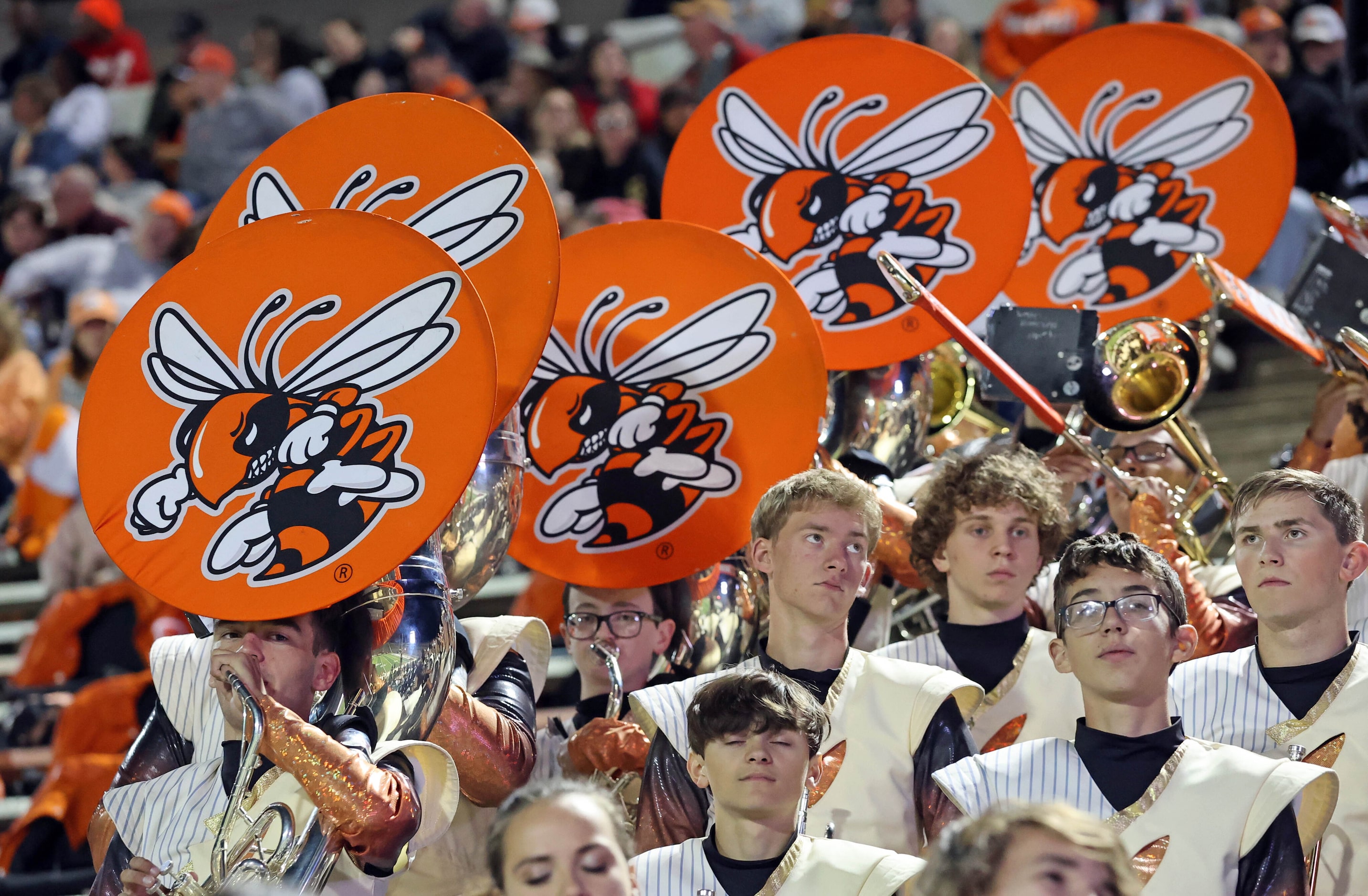 Rockwall High band members watch their team run the score up during the first half of a high...