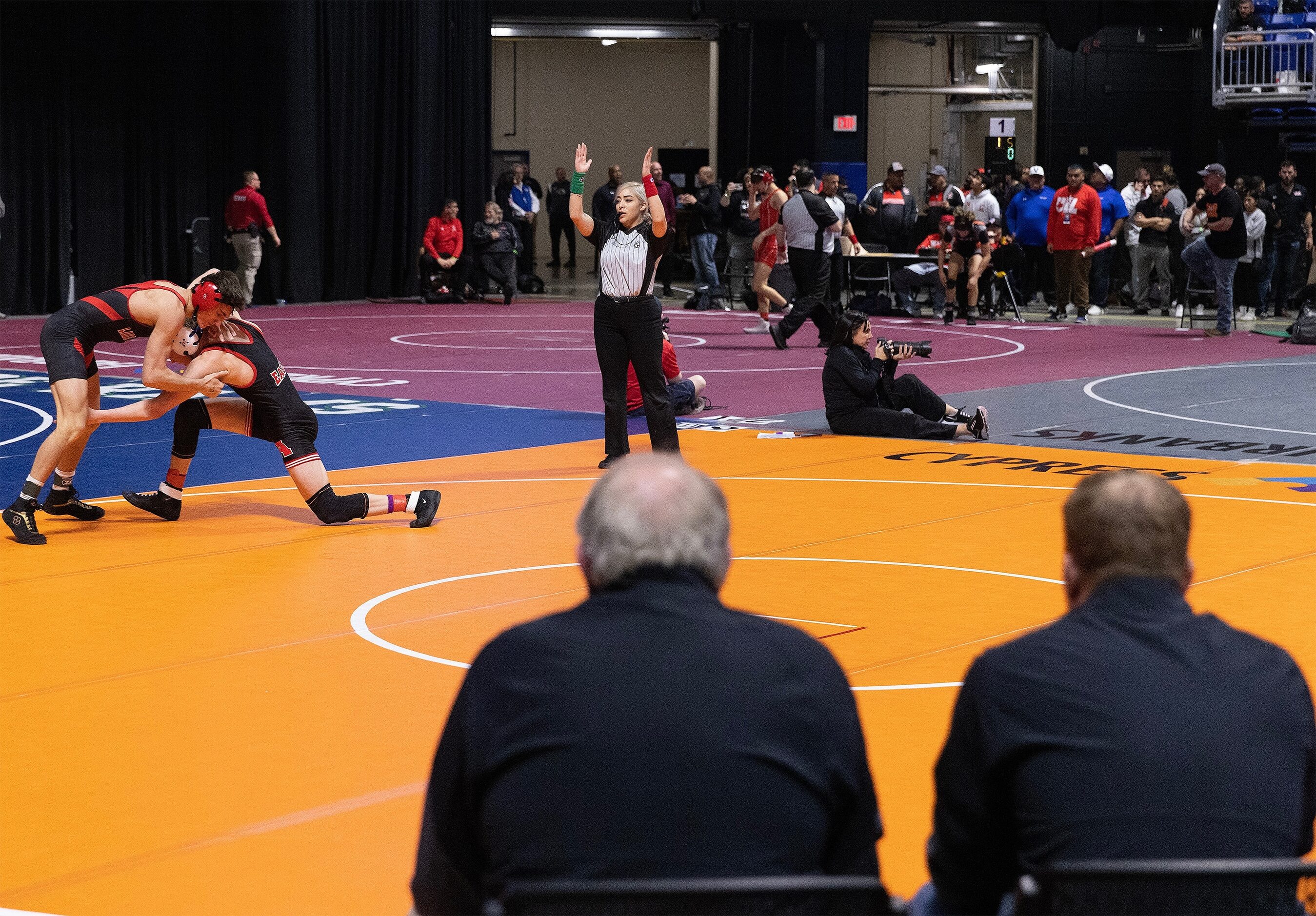 Joseph Liescheski from Allen (top) wrestles Will Deutschlander from Austin Lake Travis in...