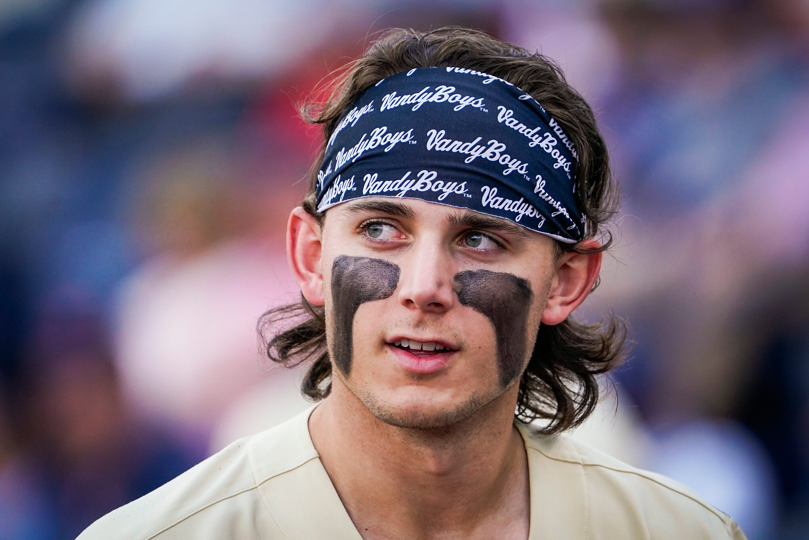 Vanderbilt infielder Carter Young looks out from the dugout during  an NCAA baseball game...