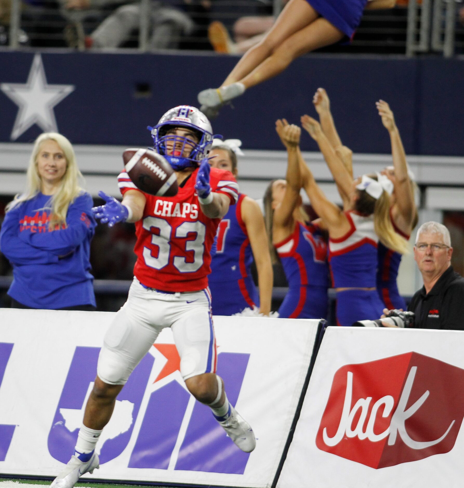 Austin Westlake special teams player Jackson Kayser (33) reaches for the ball as Chaparrals...