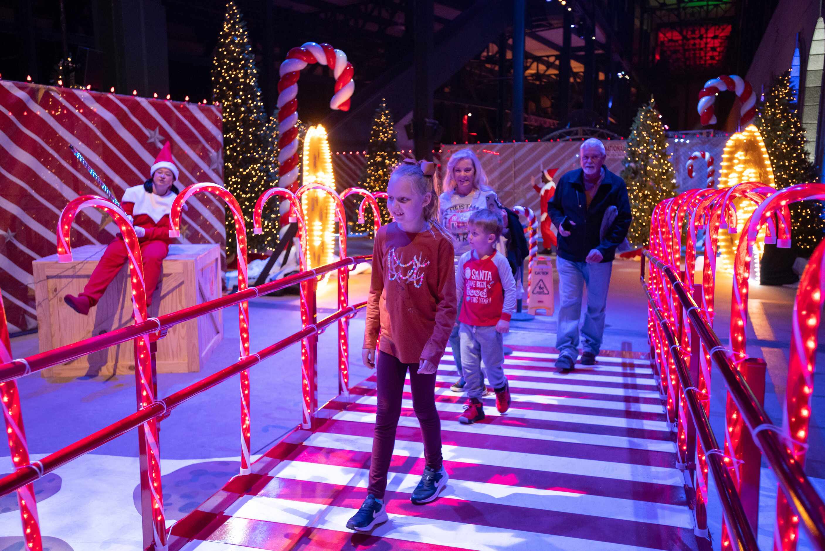 Families can walk through the "Elf on the Shelf" Magical Holiday Journey immersive exhibit...