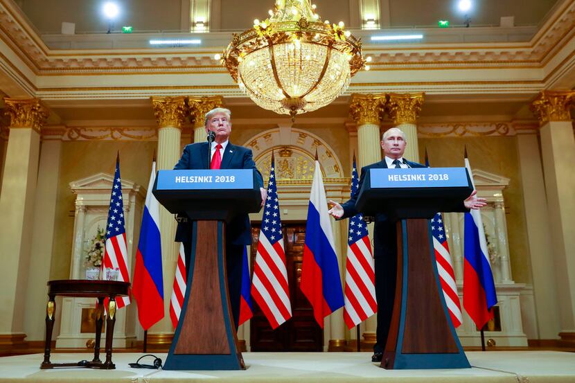 President Donald Trump and President Vladimir Putin of Russia appear at a joint news...