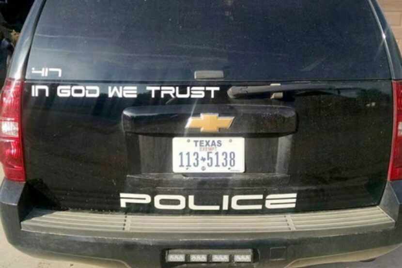 
Readers sound off about having “In God We Trust” on police cars. 



