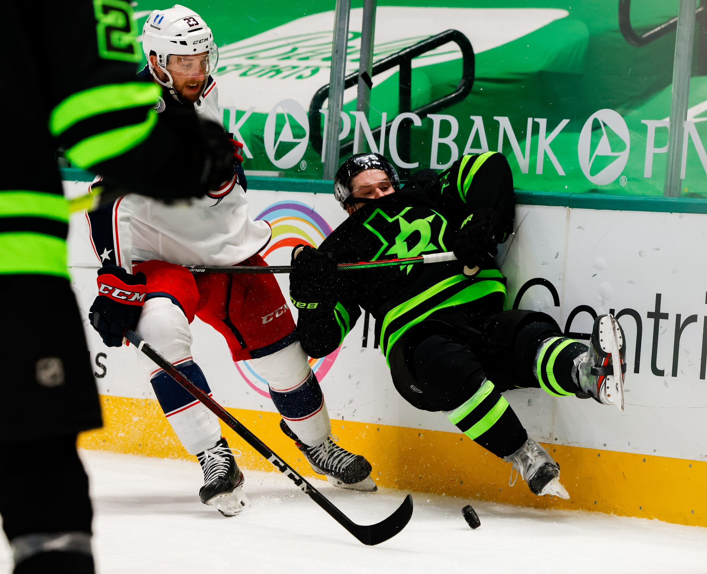 Dallas Stars defenseman Sami Vatanen (45) falls while chasing after the pack against...