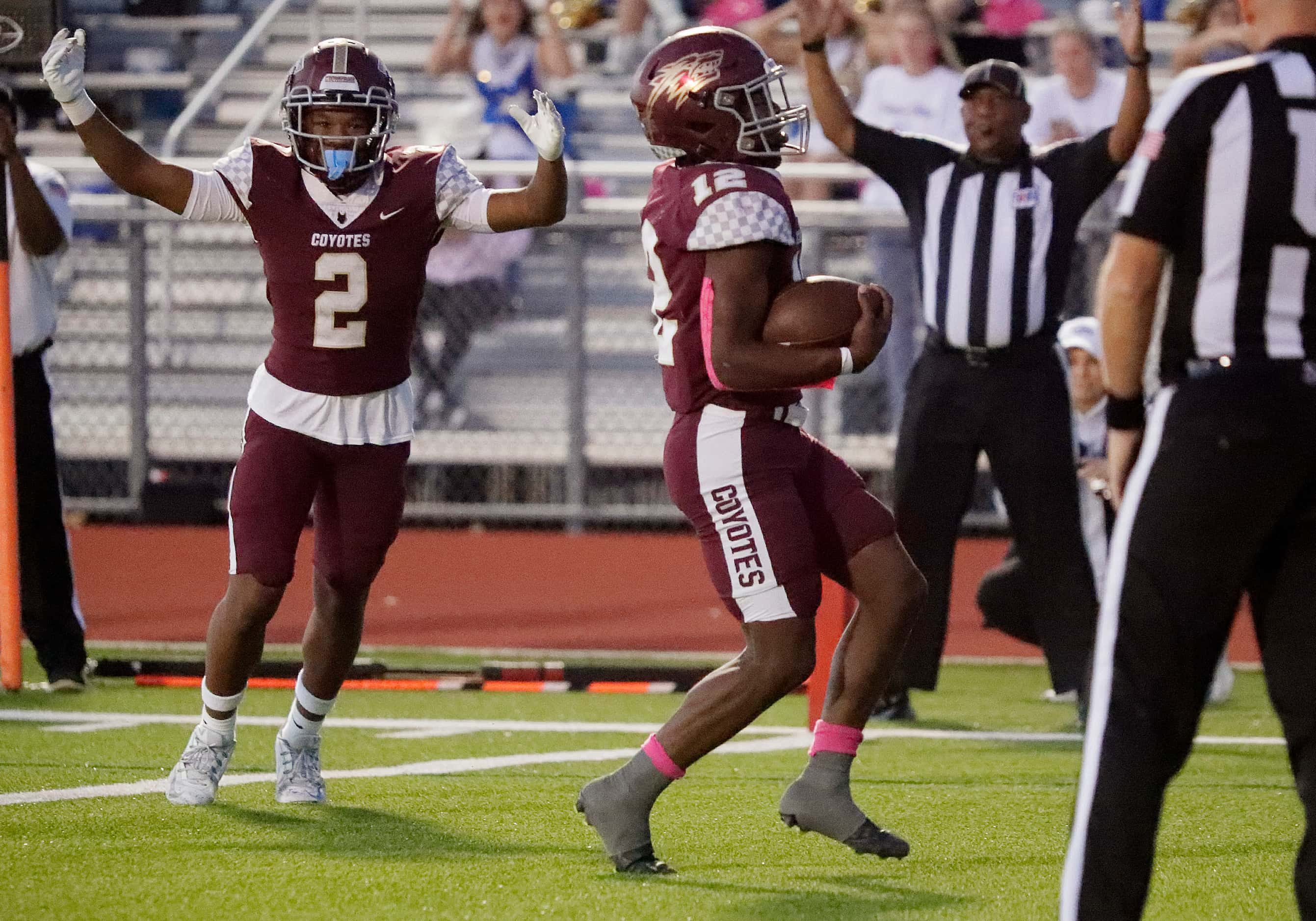 Frisco Heritage High School running back Kentra Britton (12) goes untouched into the end...