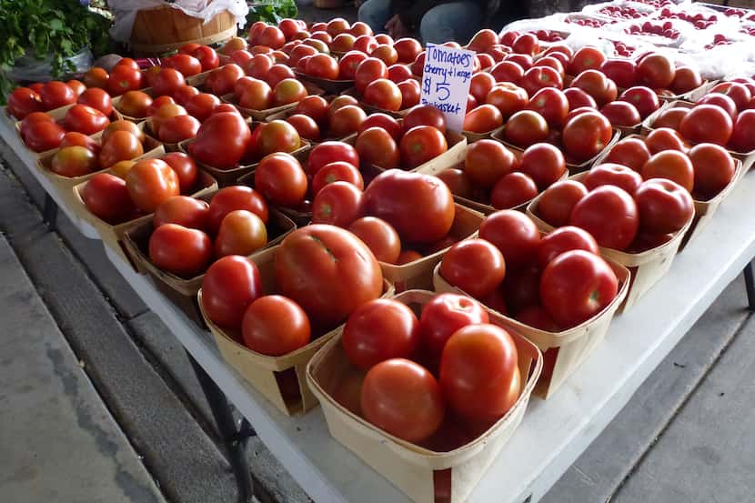 Some farmers bring greenhouse-grown tomatoes to the farmers market.