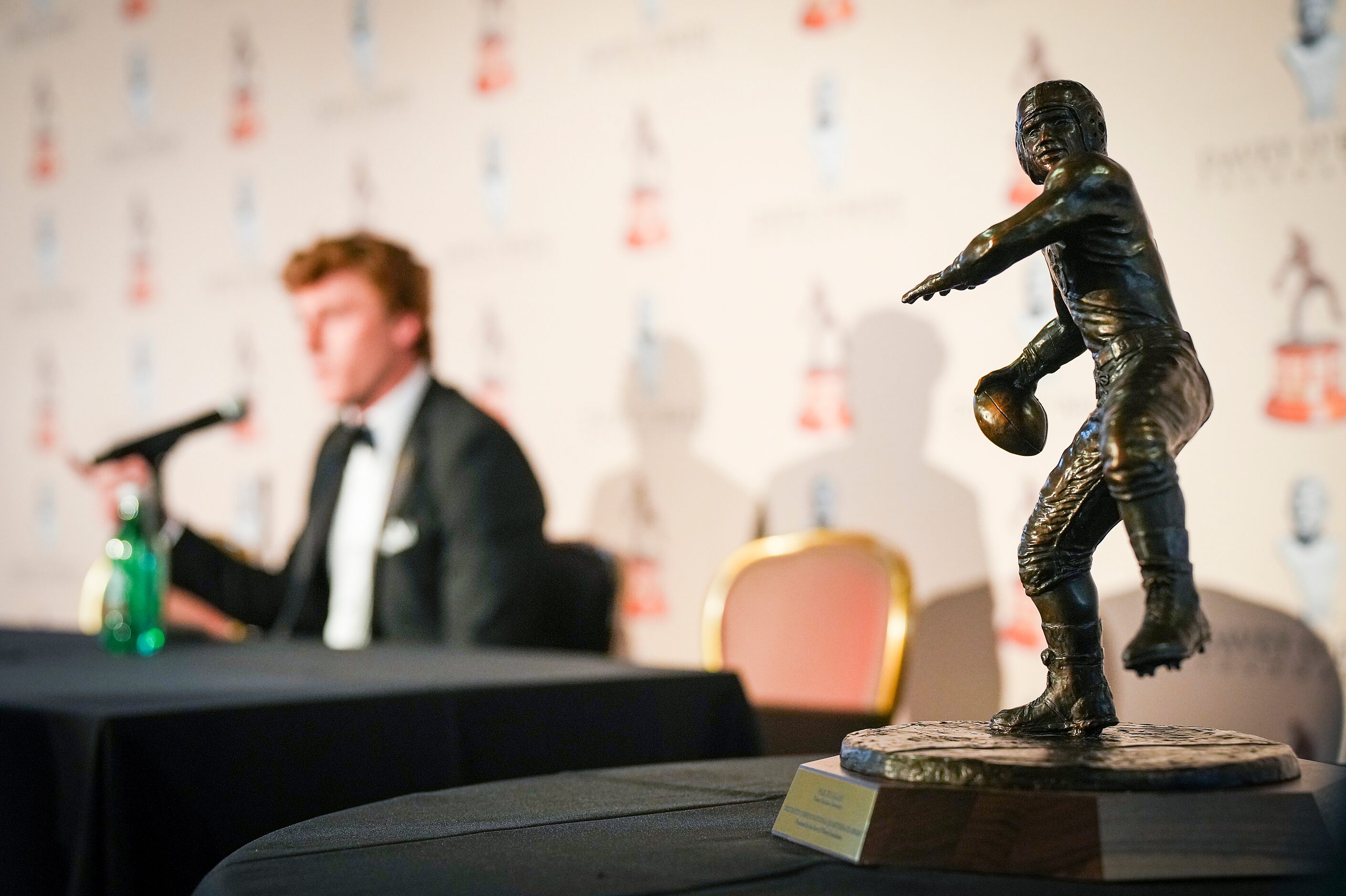 TCU quarterback Max Duggan speaks to reporters behind the Davey O'Brien Award, given to...