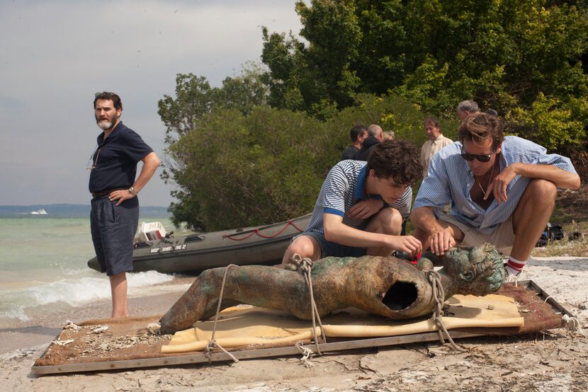 From left, Michael Stuhlbarg, Timothee Chalamet and Armie Hammer in a scene from Call Me by...