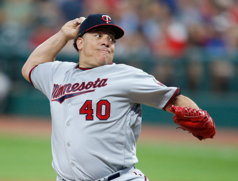 File-This Sept. 26, 2017, file photo shows Minnesota Twins starting pitcher Bartolo Colon...