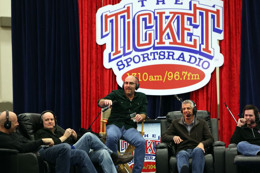 Robert Wilonsky, center, moderates The Ticket Sports Radio panel discussion, celebrating the...
