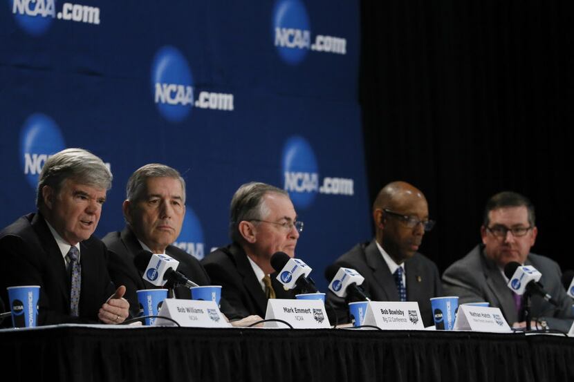 Apr 6, 2014; Arlington, TX, USA; NCAA president Mark Emmert, Big 12 commissioner Bob...
