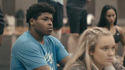 Jerry Harris from the Netflix docuseries "Cheer" sits on the mat with his teammates during a...