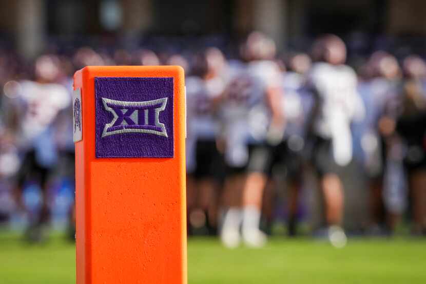 The Big 12 logo is seen on an end zone marker during the second half of an NCAA football...