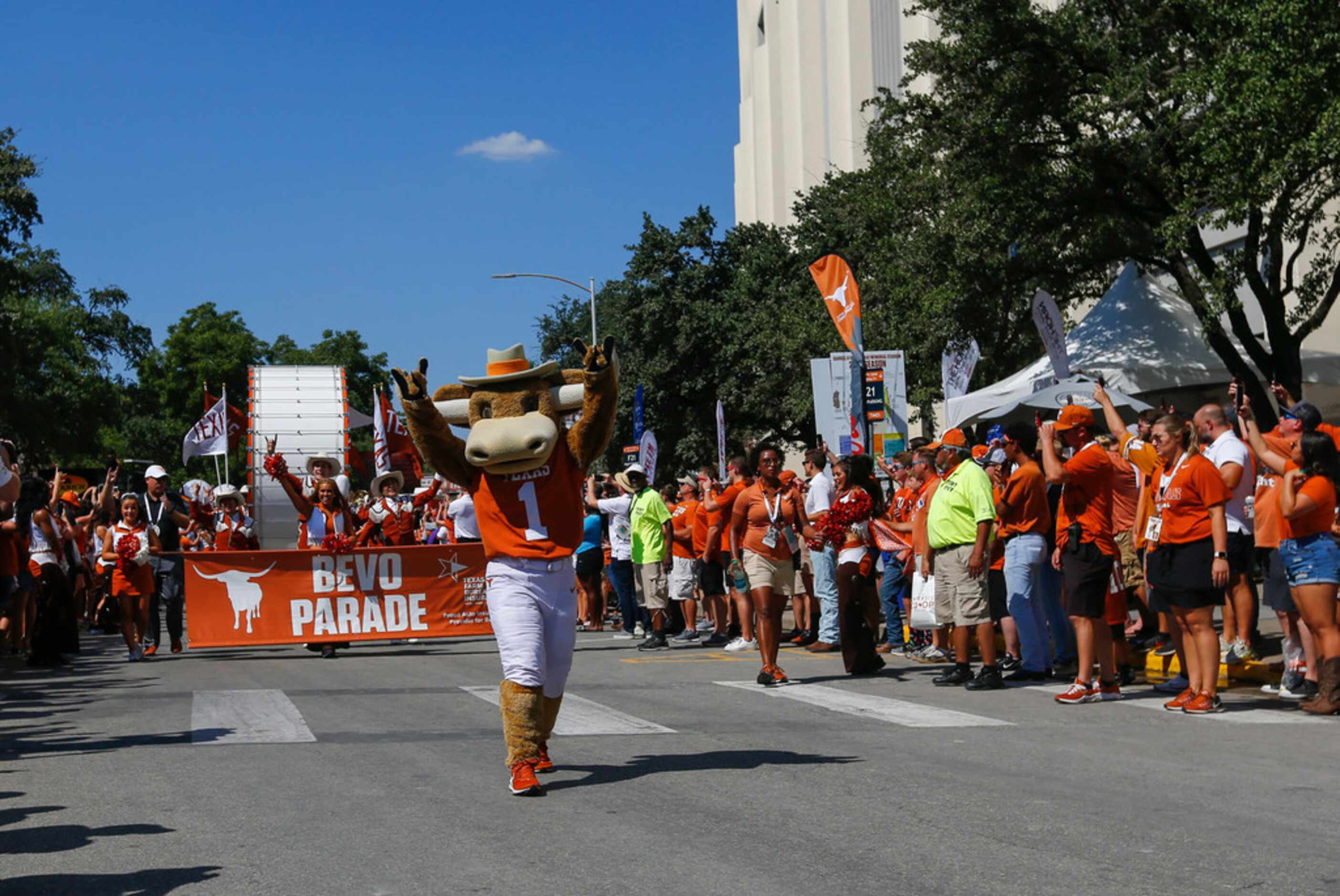 Fans gather for the Bevo Parade prior to a college football game between the University of...