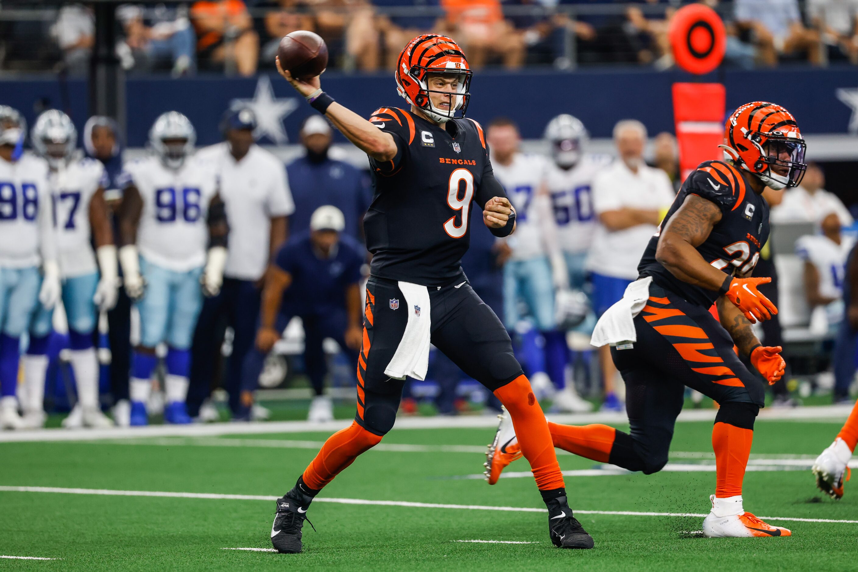 Cincinnati Bengals quarterback Joe Burrow (9) attempts a pass against the Dallas Cowboys...