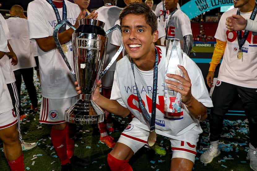 USL-1 Final MVP Arturo Rodriguez poses with the MVP and Championship trophies following the...