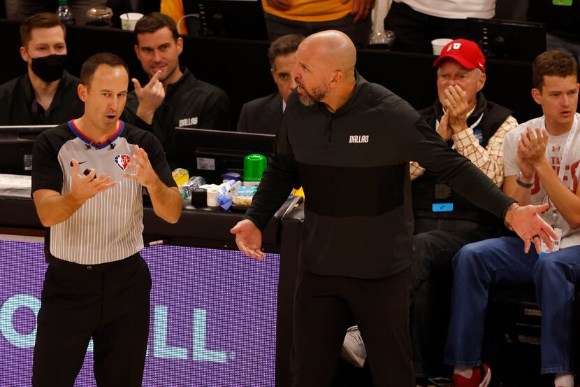 Dallas Mavericks head coach Jason Kidd talks with a referee during the third quarter of game...