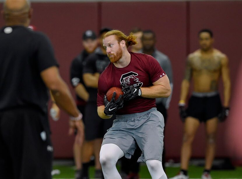 South Carolina's Hayden Hurst runs drills during South Carolina's NFL football pro day...