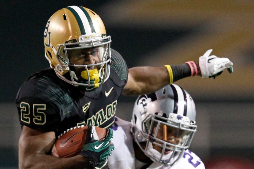 Lache Seastrunk's Heisman prediction draws different opinions from opposing Big 12 players....
