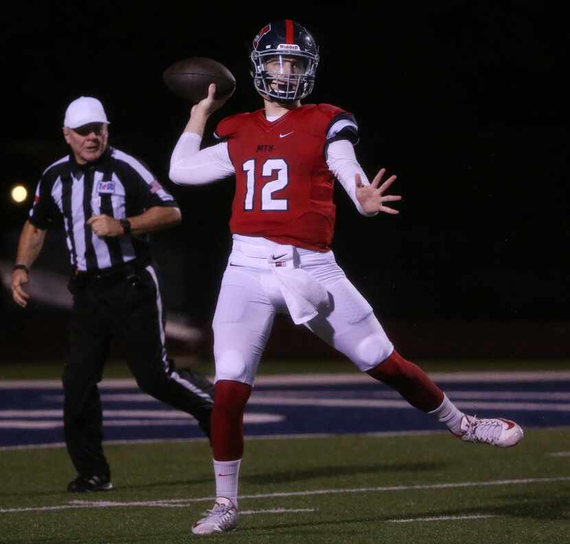 McKinney Boyd quarterback Grant Restmeyer (12) throws the ball during a high school football...