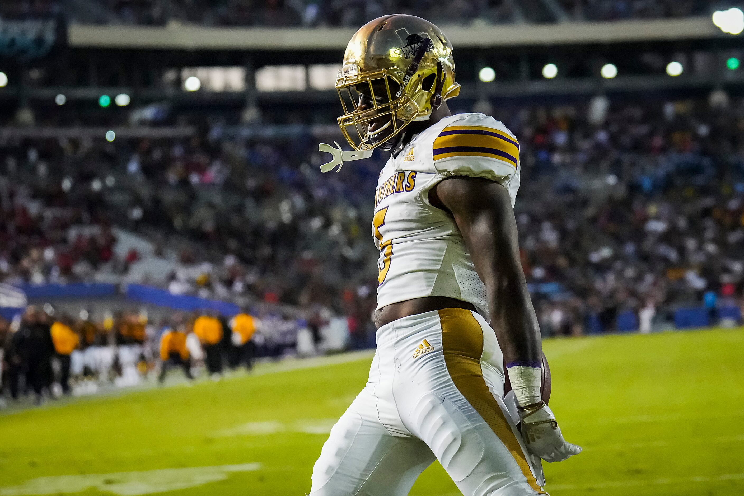 Prairie View running back Ahmad Antoine celebrates after a touchdown run during the first...