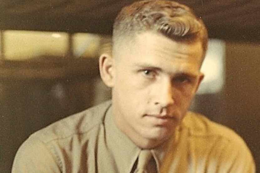 A photo of young Scott Smith in his brown Marine uniform, complete with a tie and a Smith's...