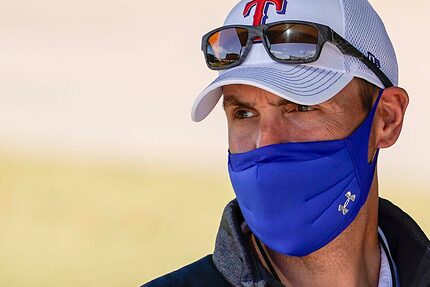 Texas Rangers executive vice president & general manager Chris Young watches during a spring...