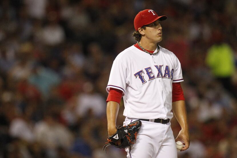 Texas Rangers pitcher Derek Holland , prior to being pulled from the Houston Astros game by...