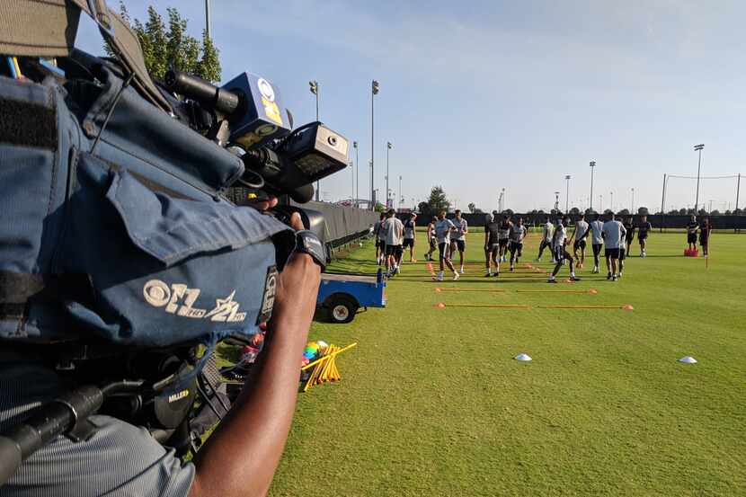 A TV news camera shoots FC Dallas training. (7-6-18)