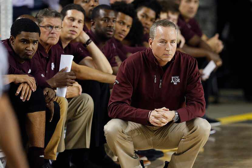 Aggies coach Billy Kennedy watches during a college basketball match of the Armed Forces...