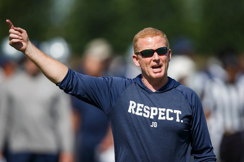 Dallas Cowboys head coach Jason Garrett gives directions during the third and final round of...