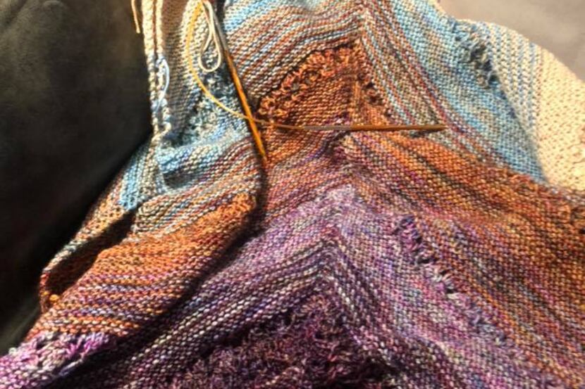 Angela Turnage of Dallas knitted this wrap. Knitting brings her solace.