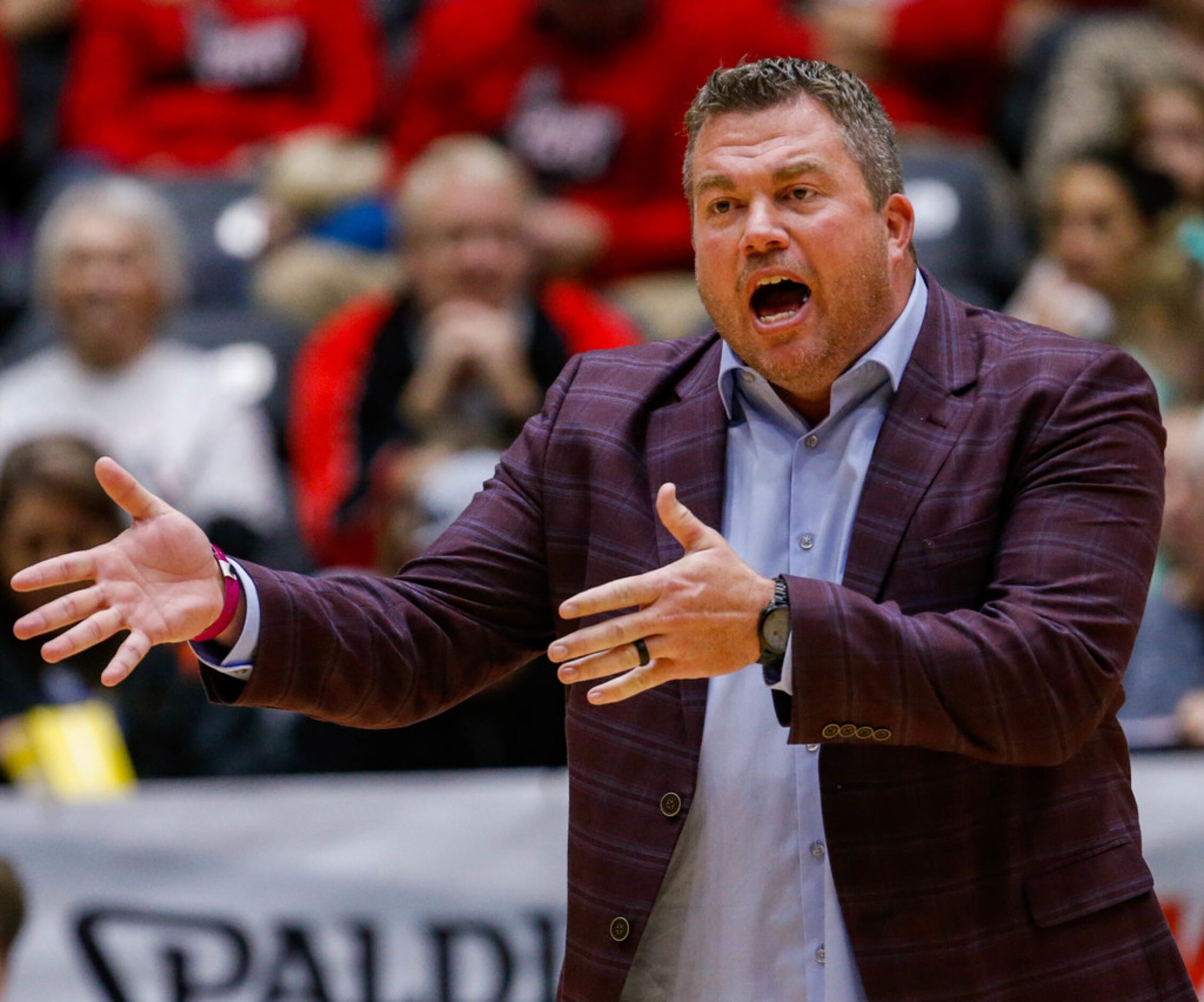 Lucas Lovejoy coach Ryan Mitchell during a class 5A volleyball state semifinal match against...