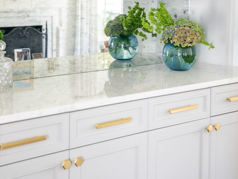 gray cabinets with gold hardware
