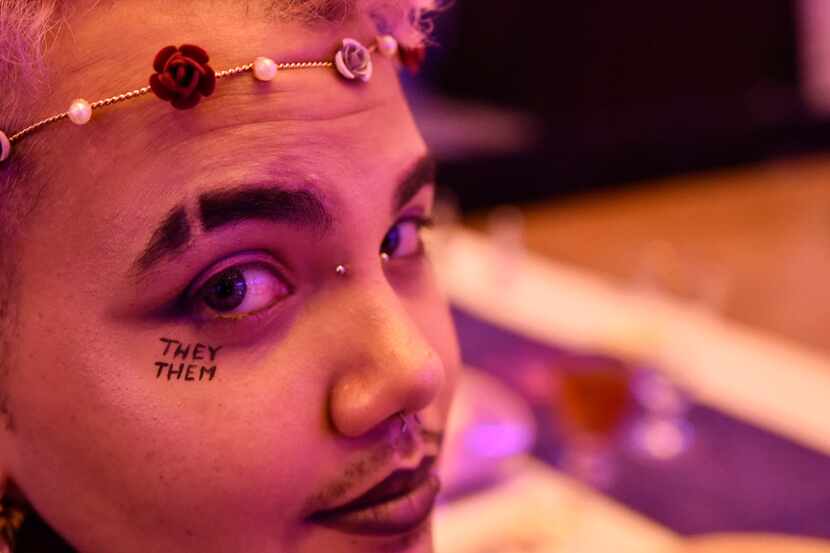 Jekksyn Icaro, 28, of North Carolina, showed off the words they and them under their eye...