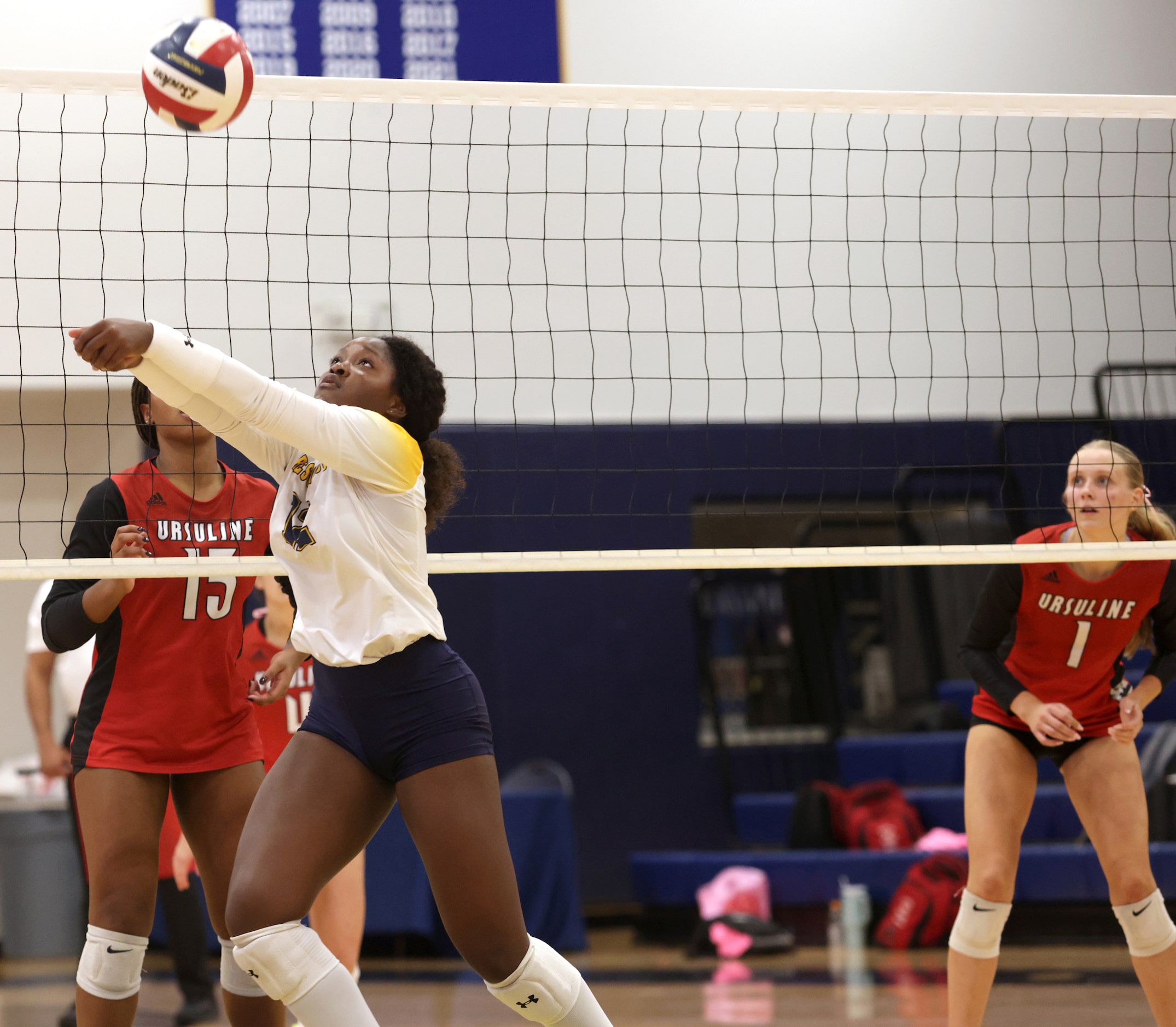 Prestonwood player #12 Taylor Cook sets the ball during the Ursuline Academy of Dallas...