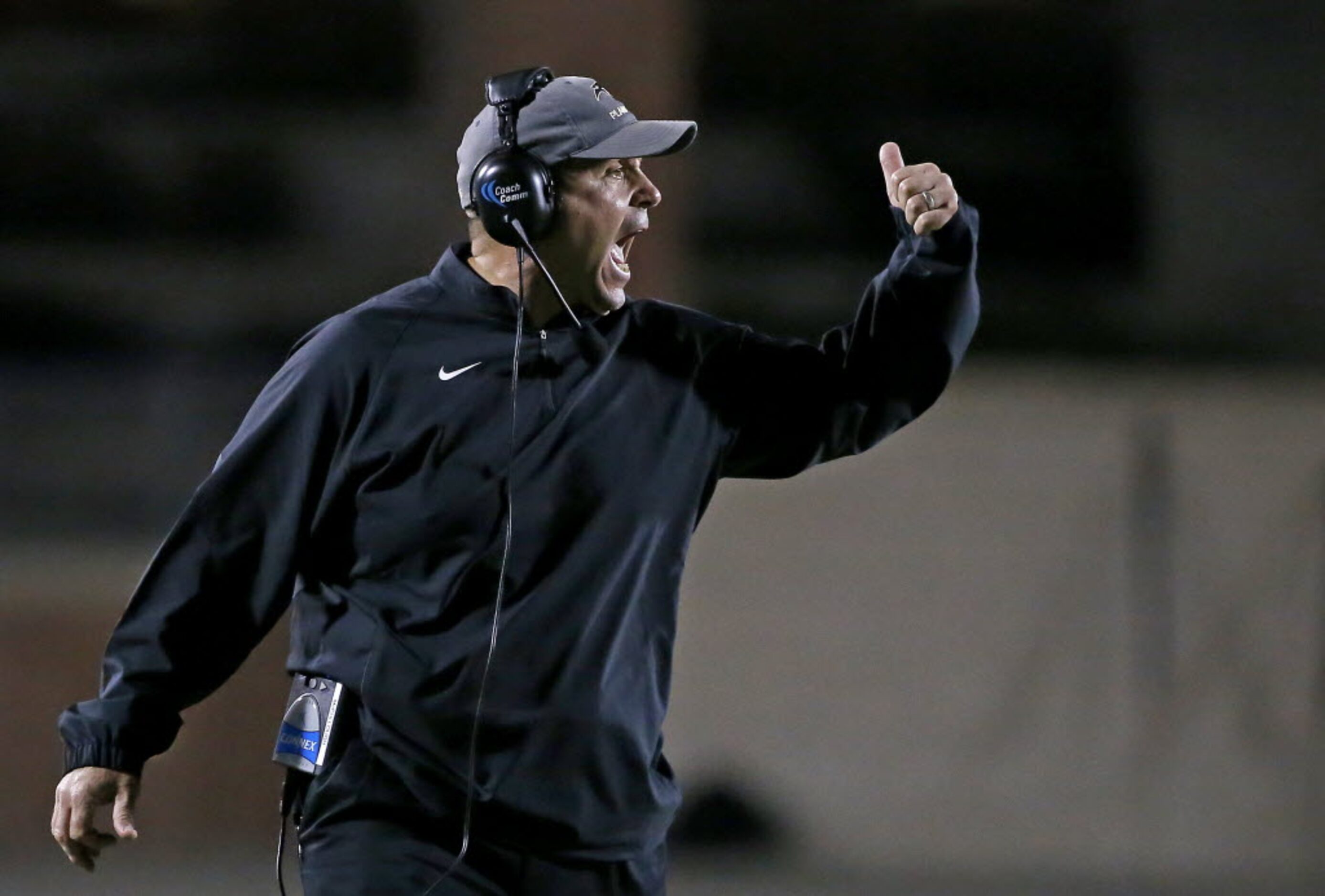 Plano East Head Coach Joey McCullough yells during the second half against Allen at Eagle...