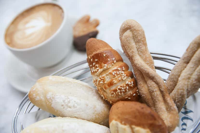 The pastry basket and cafe latte